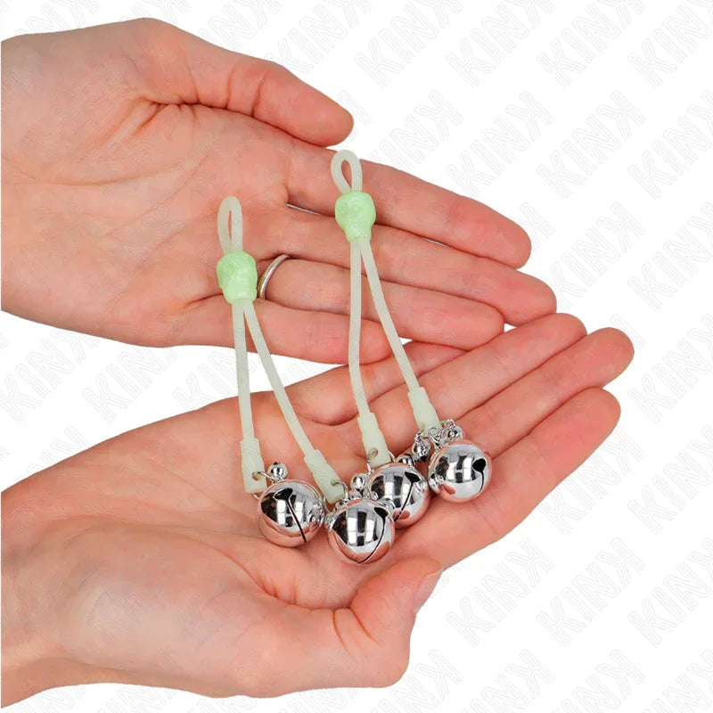 KINK - PINZAS PARA PEZONES LUMINOSAS FORMA CALABERA CON CASCABEL SONORO AJUSTABLE VERDE / PLATEADO - Nuvica