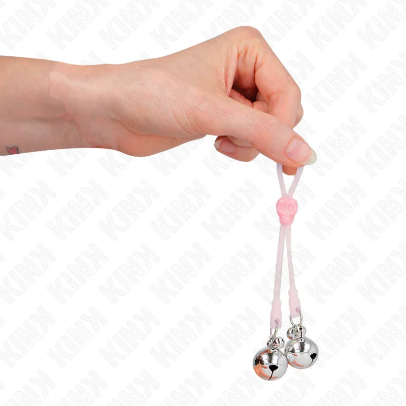 KINK - PINZAS PARA PEZONES LUMINOSAS FORMA CALABERA CON CASCABEL SONORO AJUSTABLE ROSA / PLATEADO - Nuvica