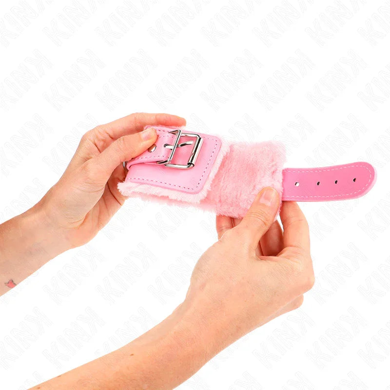 KINK - MUÑEQUERAS FORRADAS ROSA CON CORREA ROSA AJUSTABLE 20-29 CM X 5.5 CM - Nuvica