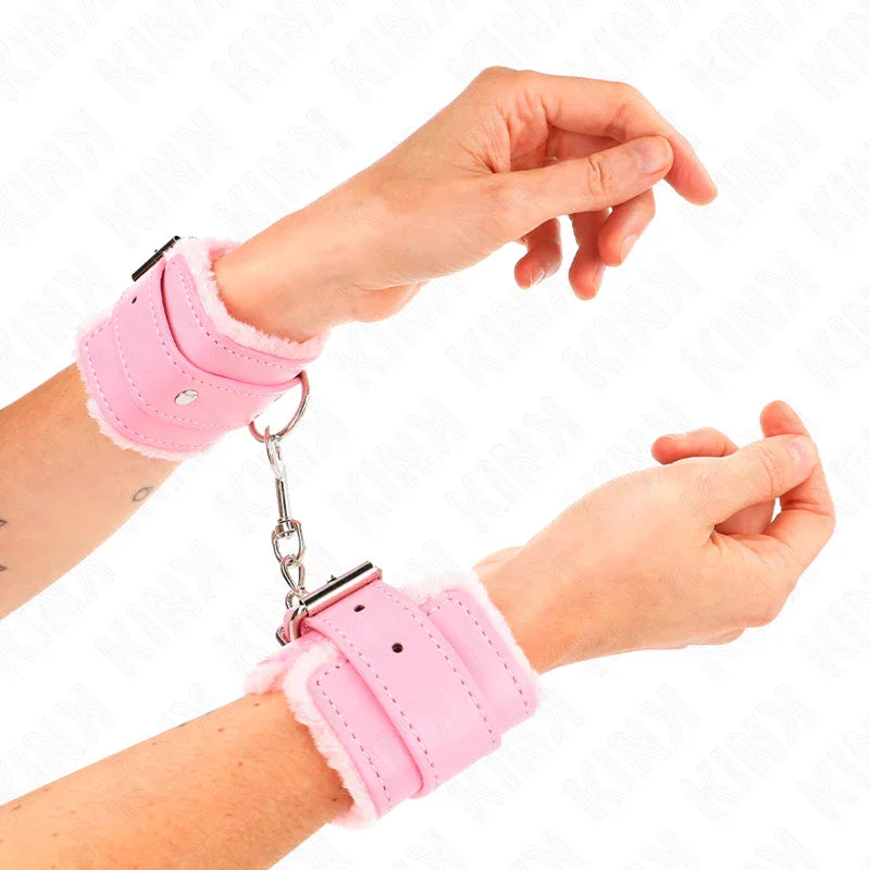KINK - MUÑEQUERAS FORRADAS ROSA CON CORREA ROSA AJUSTABLE 20-29 CM X 5.5 CM - Nuvica