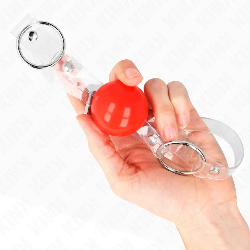 KINK - MORDAZA DE BOLA ROJA DE PVC TRANSPARENTE AJUSTABLE - Nuvica