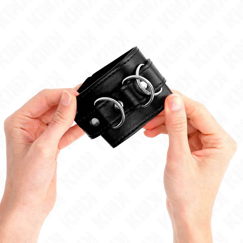 KINK - MUÑEQUERAS CON 3 ANILLAS EN D AJUSTABLE NEGRO 17.5-25 CM X 6 CM - Nuvica