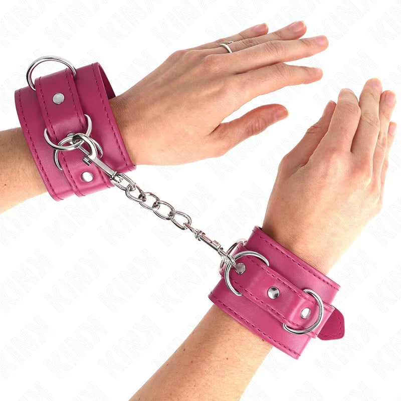 KINK - MUÑEQUERAS CON 3 ANILLAS EN D AJUSTABLE ROSA 17.5-25 CM X 6 CM - Nuvica