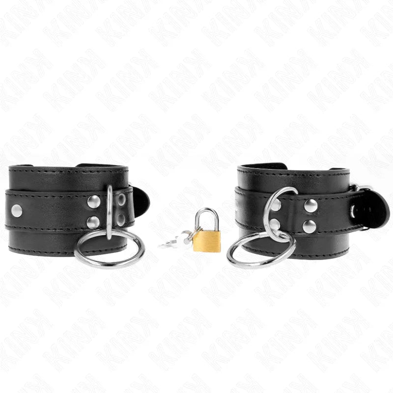 KINK - MUÑEQUERAS CON BLOQUEO DE CANDADO EN ANILLAS NEGRO AJUSTABLE 20-28 CM X 5.5 CM - Nuvica