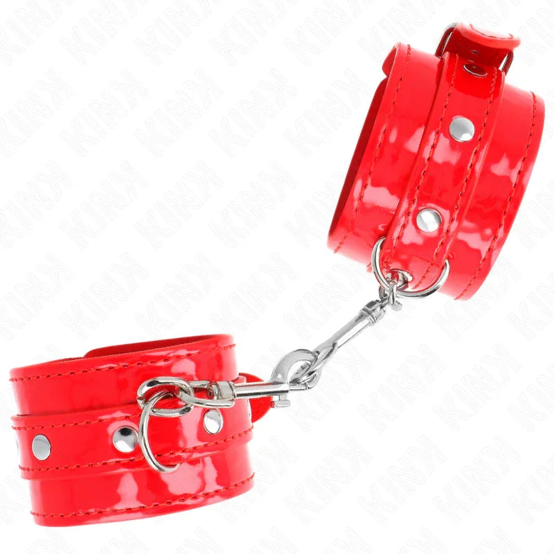 KINK - MUÑEQUERAS CON TACHUELAS ROJO AJUSTABLE 23-33 CM - Nuvica