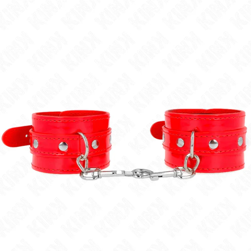 KINK - MUÑEQUERAS CON TACHUELAS ROJO AJUSTABLE 23-33 CM - Nuvica