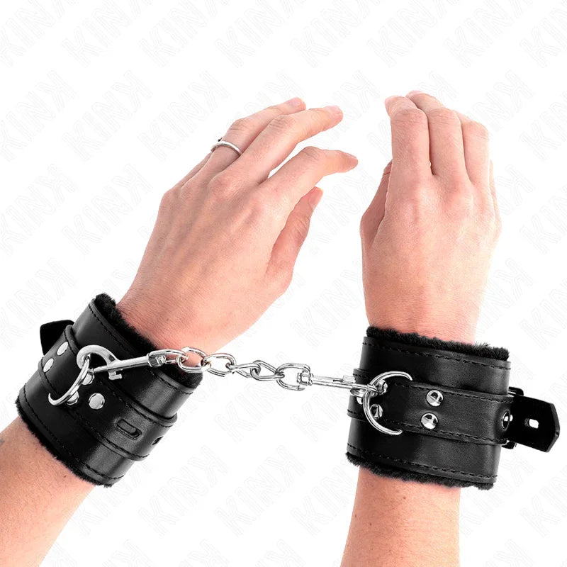 KINK - MUÑEQUERAS FORRADAS CON AGUJEROS CUADRADOS NEGRO Y CORREA NEGRO AJUSTABLE 17-29 CM X 6 CM - Nuvica