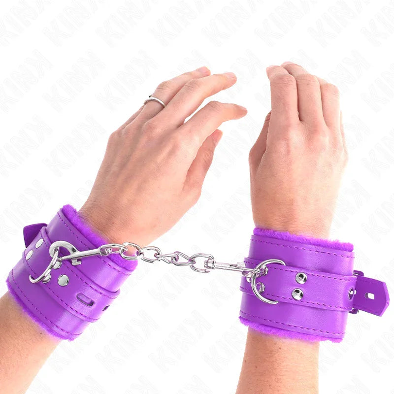 KINK - MUÑEQUERAS FORRADAS CON AGUJEROS CUADRADOS VIOLETA Y CORREA VIOLETA AJUSTABLE 17-29 CM X 6 CM - Nuvica