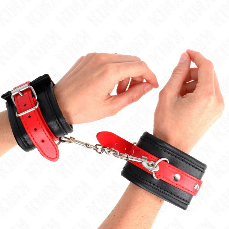KINK - MUÑEQUERAS NEGRO CON CORREA ROJO AJUSTABLE 17-28 CM X 6 CM - Nuvica