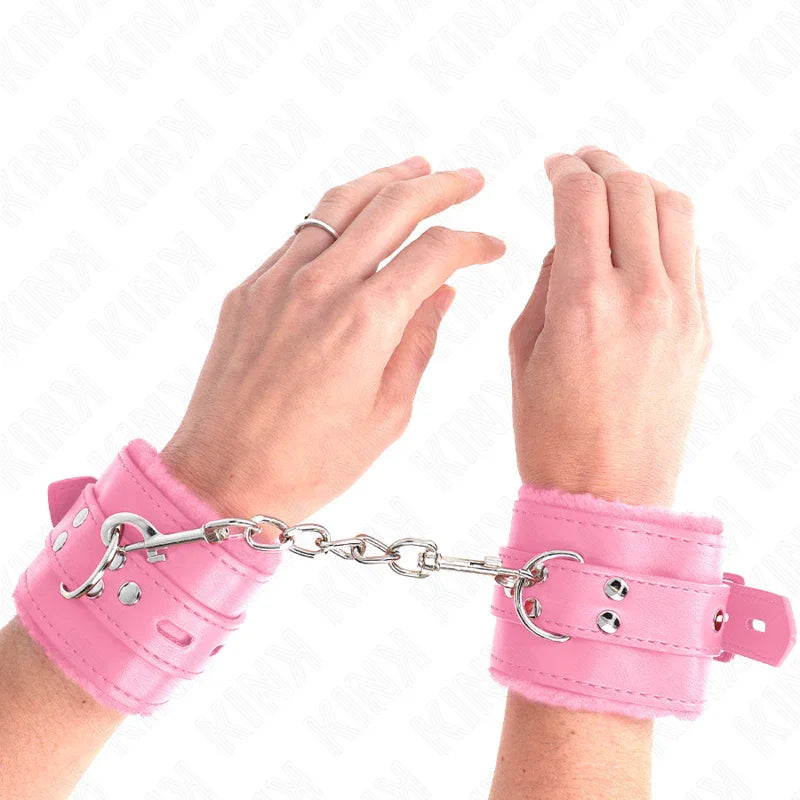 KINK - MUÑEQUERAS FORRADAS CON AGUJEROS CUADRADOS ROSA Y CORREA ROSA AJUSTABLE 17-29 CM X 6 CM - Nuvica