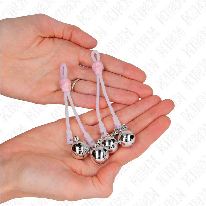 KINK - PINZAS PARA PEZONES LUMINOSAS FORMA CALABERA CON CASCABEL SONORO AJUSTABLE ROSA / PLATEADO - Nuvica