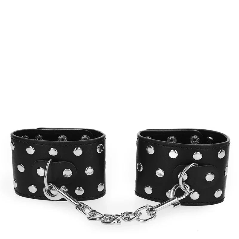 KINK - MUÑEQUERAS CON CIERRE A PRESIÓN LLENO DE TACHUELAS AJUSTABLE NEGRO 19-24 CM X 5.5 CM - Nuvica