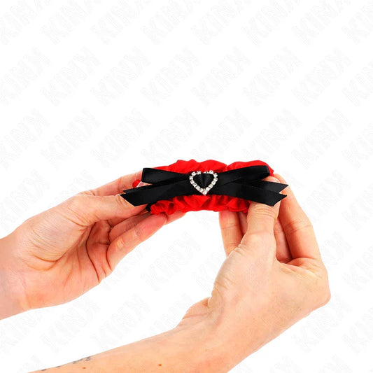 KINK - MUÑEQUERAS ELÁSTICAS DE ENCAJE CON DETALLE CORAZÓN ROJO AJUSTABLE 22-35 CM - Nuvica