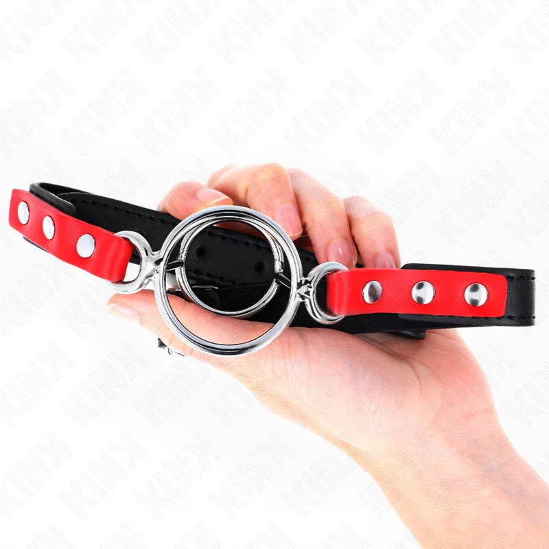 KINK - MORDAZA CON MÚLTIPLES JUNTAS TÓRICAS 4 / 4.8 CM ROJO AJUSTABLE 38 X 56 CM - Nuvica