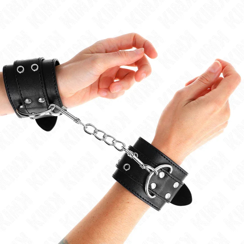 KINK - MUÑEQUERAS CON DOBLE LÍNEA DE TACHUELAS NEGRO AUSTABLE 19-26 CM - Nuvica