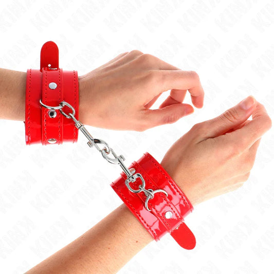 KINK - MUÑEQUERAS CON TACHUELAS ROJO AJUSTABLE 23-33 CM - Nuvica