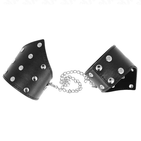 KINK - MUÑEQUERAS ESTILO PUNTIAGUDO NEGRO CON CADENA AJUSTABLE 17-23 CM X 8.5 CM - Nuvica