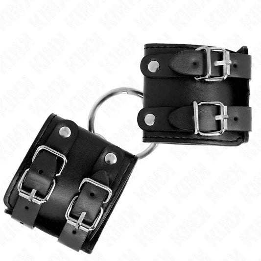 KINK - MUÑEQUERAS FIJAS CON ANILLA Y TACHUELAS NEGRO AJUSTABLE 17-22 CM X 6.5 CM - Nuvica