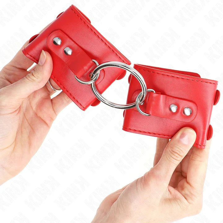 KINK - MUÑEQUERAS FIJAS CON ANILLA Y TACHUELAS ROJO AJUSTABLE 17-22 CM X 6.5 CM - Nuvica