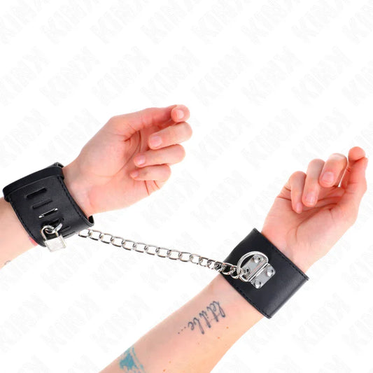 KINK - MUÑEQUERAS FIJAS CON CADENA 30 CM Y CIERRE CANDADO NEGRO AJUSTABLE 16-23 CM X 5.5 CM - Nuvica