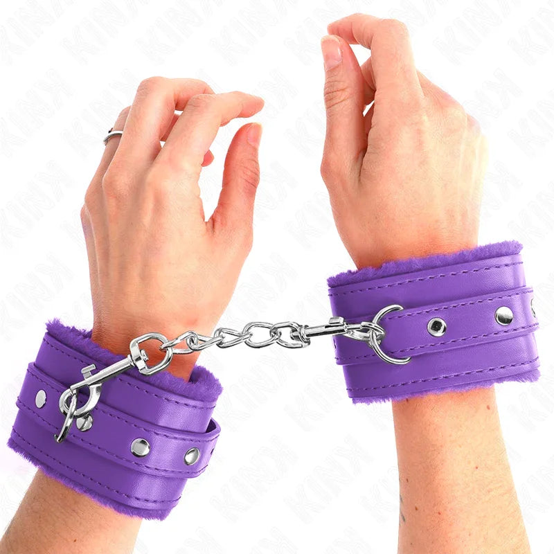 KINK - MUÑEQUERAS FORRADAS PREMIUM VIOLETA CON CORREA VIOLETA AJUSTABLE 17-29 CM X 6 CM - Nuvica