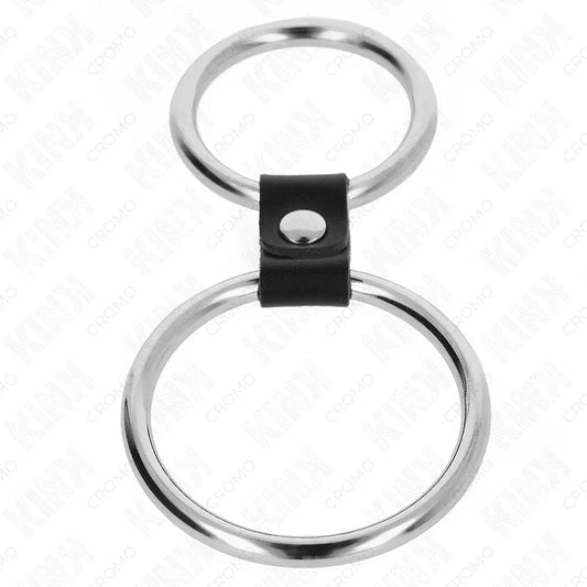 KINK - ANILLO PENE DOBLE METAL 3.7 CM A 5 CM CONECTADOS POR CORREA POLIPIEL MODELO 1 - Nuvica