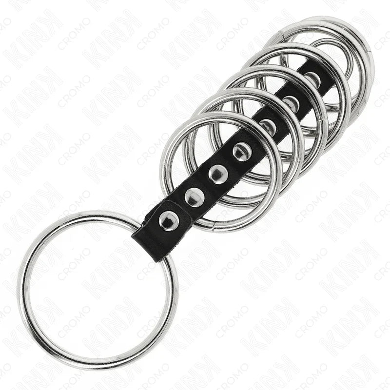KINK - 7 ANILLOS PENE METAL 3.2 CM A 5 CM CONECTADOS POR POLIPIEL - Nuvica