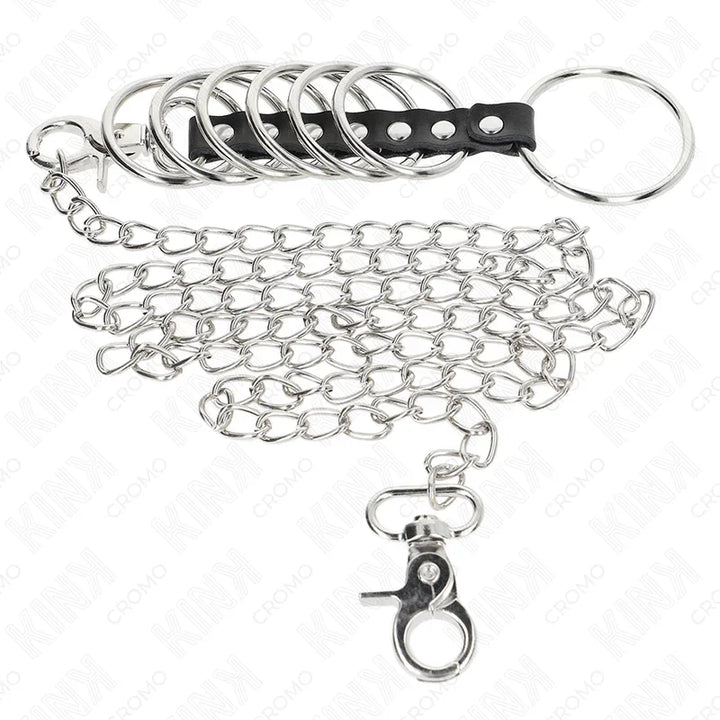 KINK - 7 ANILLOS PENE METAL 3.8 CM A 5 CM CONECTADOS CON POLIPIEL Y CADENA METAL 100 CM - Nuvica